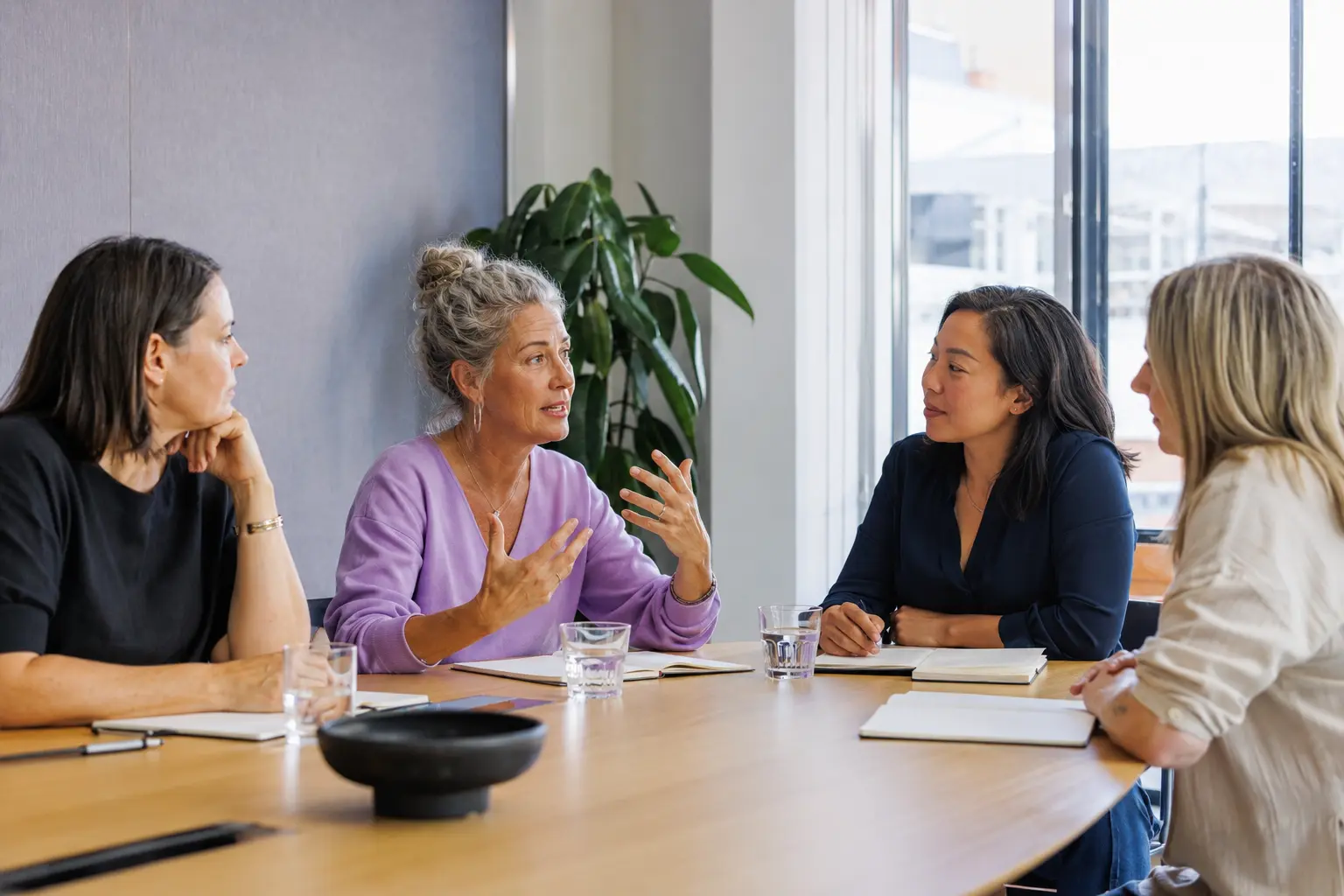 A small group discussing personal-safety education in a professional workshop